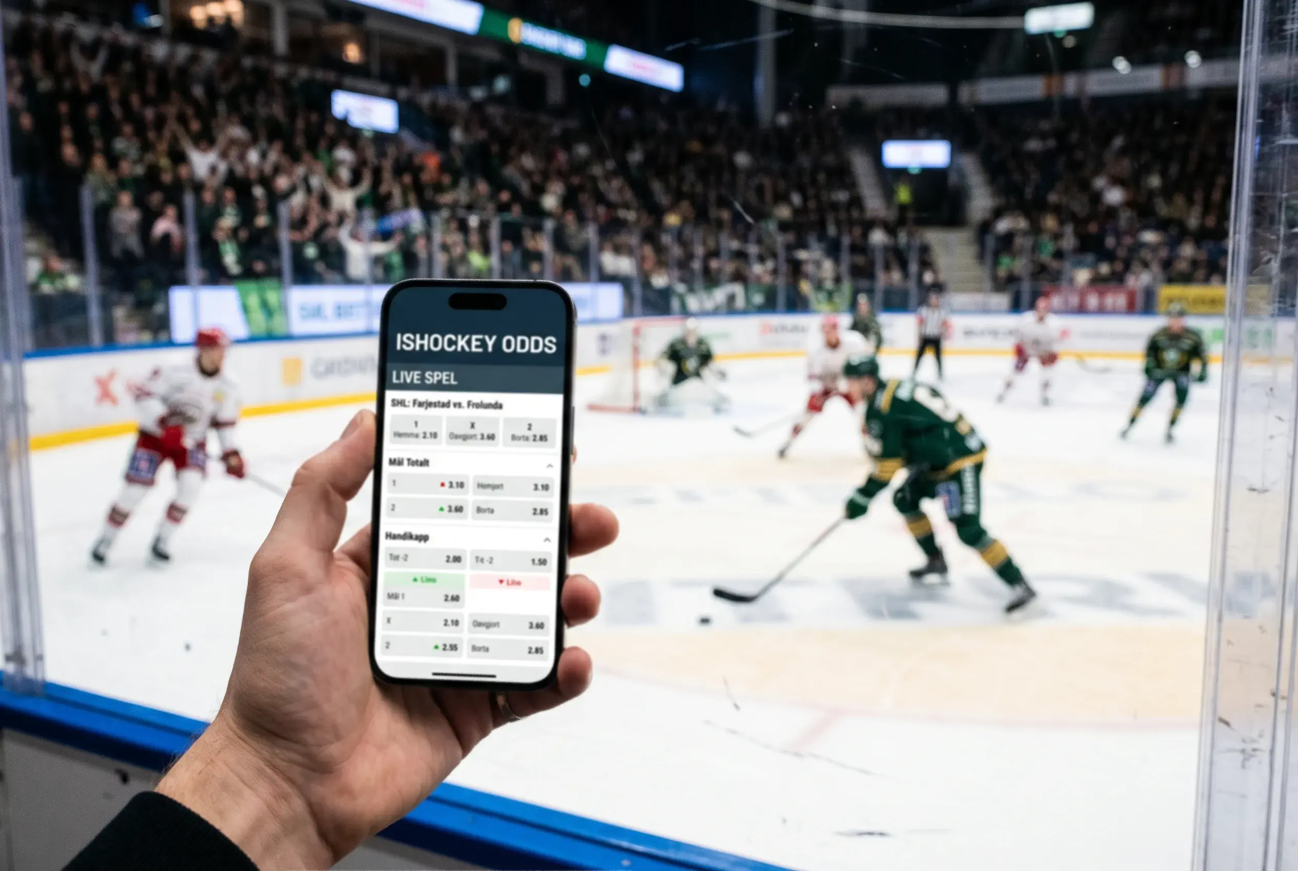 Smartphone i en hånd foran en ishockeybane med kamp i gang